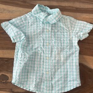 Adorable plaid slightly seersucker fabric boys button down in soft aqua